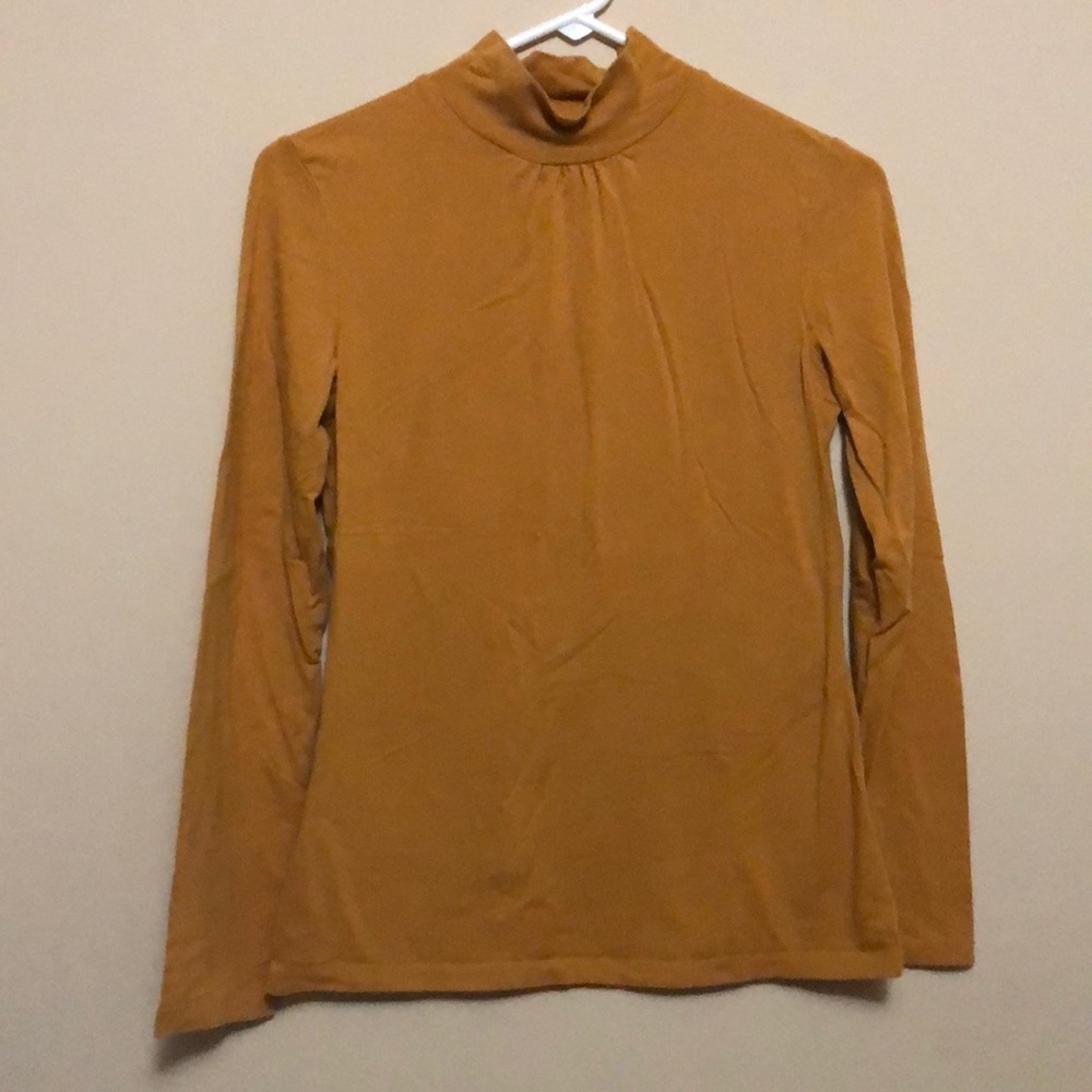 ON mustard turtleneck